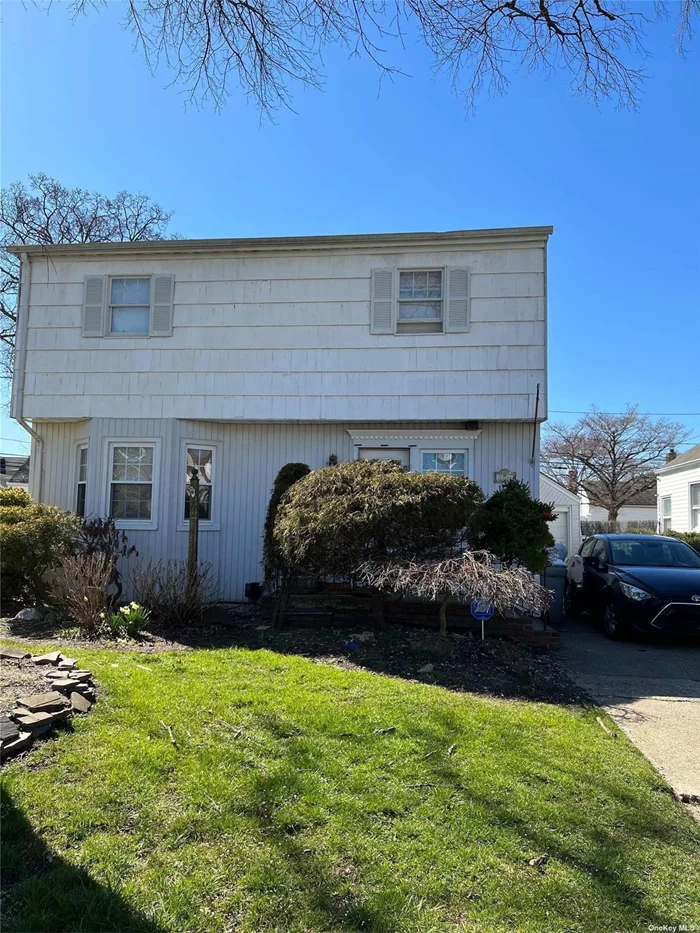 Beautiful 2-story house in the Gibson area of Valley Stream. It contains 4 bedrooms and 2 full bathrooms. New roof and new floor for the entire house. One detached car garage, private driveway. Fenced yard with a nice clean backyard. Gas heating, Central air. Move in condition. 10 minutes to train station.