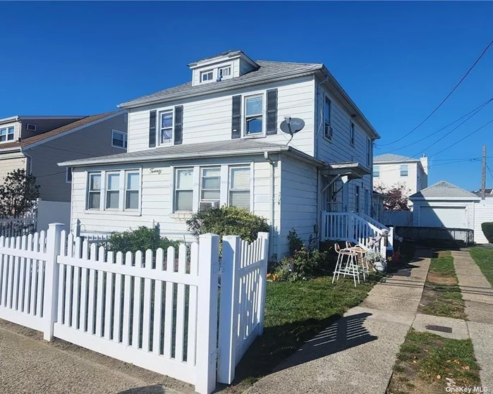 Commuters delight!! Legal 2 Family on oversized 80x100 lot. Quietly located in the heart of the village, 2 blocks from LIRR with direct line to NYC. Completely renovated in 2015! Side by Side, townhome style, 3 story units. Both with separate detached garages and driveway. 2 sets of appliances, 2 Laundrys. 4 bedrooms, 2Bath on the left side. 3 bedrooms, 1.5 bath on the right side. House will be delivered vacant. Flood Insurance $2024yr