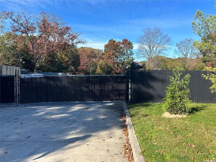 100 x 50 lot ideal for contractors or landscapers. Fenced lot with security cameras, water and electric on lot, can have small office / container in front corner of lot. The following CANNOT be stored on lots: medical work, retail, tractor trailers. (Two lots available - other lot is 60x50)