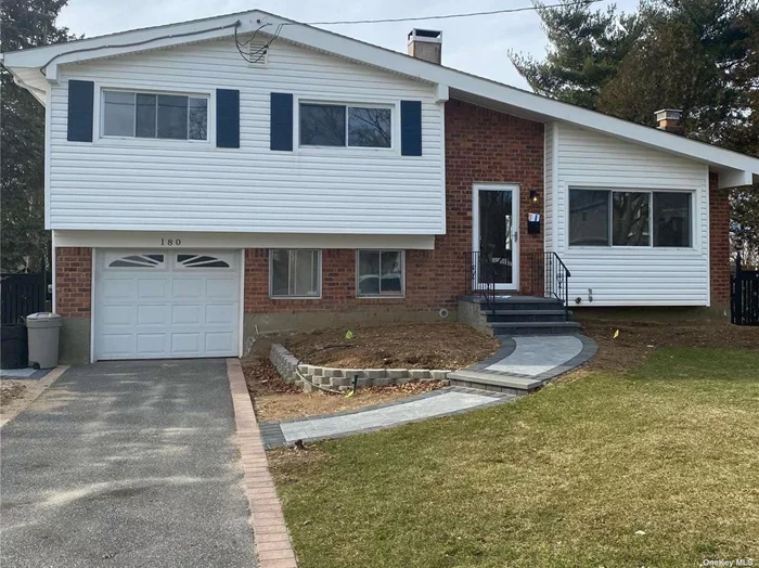 Beautifully Renovated Split Ranch Featuring 3 Bedrooms, 1.5 Baths, Hardwood Floors Throughout, Marble Kitchen, Stainless Steel Appliances, Dishwasher, Gas Heat, Attached Garage, Half Basement w/Lots of Storage, Amazing Outdoor Space, New Brick Patio, Fully Fenced Yard.