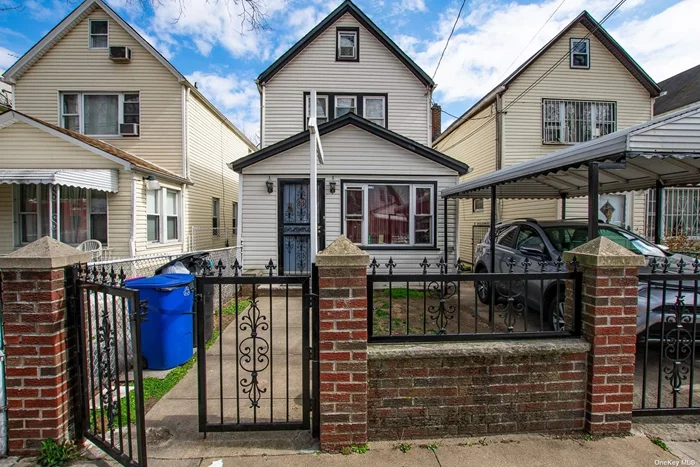 Do not miss this Opportunity of owning this Great Two family house in the prime area of S. Ozone Park!!- This can be the Opportunity that you were waiting for to own an Investment Property!!..This house its a legal two family!!! it has a lot to offer for the price!! A a full basement with an Out side Entrance. Walk-up attic, with additional living space- Nice back Yard, 1.5 Car Garage and A Private driveway! Great location!!! Near everything. Do not miss this opportunity to own your investment property in the prime area South Ozone Park!!! Walk Out Basement Has Outside Entrance,  Conveniently located near shopping, neat JFK Airport, restaurants, park and Beaches. House Being Sold AS IS. Endless Possibilities!