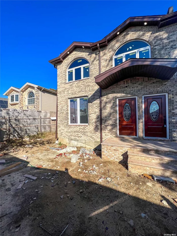 This is a beautiful 2 family home. This features 3 bedrooms and 2 bathrooms each unit. Massive Property. Beautiful work done on this NEW CONSTRUCTION.