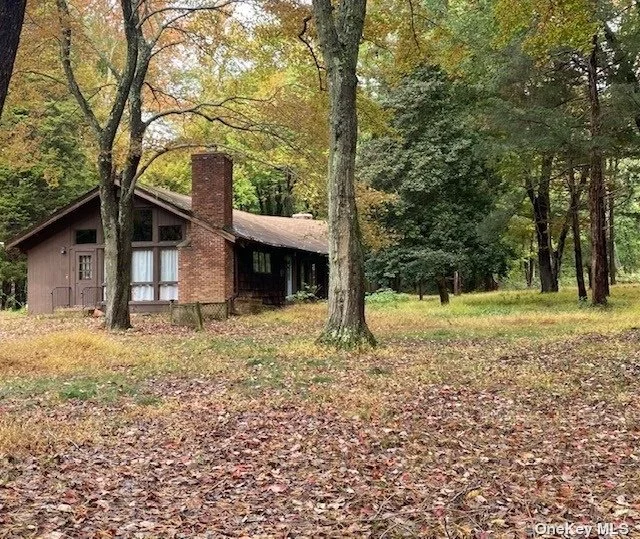 Discover the potential of this exceptional ranch-style home nestled in the coveted village of Laurel Hollow with sought-after Cold Spring Harbor schools. This is a rare opportunity for renovation enthusiasts or builders looking to craft their dream property in this prestigious neighborhood. Surrounded by million-dollar homes, this Flat 2.65-acre property offers endless possibilities. A picturesque red barn on the grounds adds character and charm to the setting. Whether you&rsquo;re looking to create your own haven or embark on a development project, this property presents a canvas of endless opportunities. House and land are being sold in As Is condition, allowing you to unleash your creative vision and transform this property into the home of your dreams. Don&rsquo;t miss the chance to make your mark in this exclusive community.