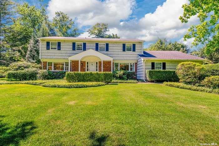 This stunning center hall colonial is perfectly situated in the highly sought after incorporated village of Muttontown. Set on a magnificent flat 1 acre lot, this private location offers tranquility while still being conveniently close to town, train, shopping, schools, and highways. Step inside and be greeted by gleaming wood floors throughout. The generously proportioned entertaining rooms provide the perfect setting for hosting gatherings and creating memories. The spacious eat-in kitchen is flooded with natural light and offers ample space for preparing meals and enjoying time with friends. Adjacent to the kitchen is a warm and inviting great room, with custom wood cabinetry and a wood-burning fireplace. Sliding doors lead to the backyard patio, creating a seamless flow for indoor-outdoor entertaining. The formal dining room is drenched with natural sunlight, creating an elegant and inviting atmosphere for special occasions. The formal living room also boasts an abundance of natural light, making it the perfect space for relaxation and unwinding. The first floor is completed by a conveniently located Bedroom, Full Bath, laundry room and powder room. Upstairs, you&rsquo;ll find an expanded master bedroom suite with a dressing room, bathroom, and walk-in closet for ample storage and privacy. Three additional large bedrooms, along with two full baths, provide plenty of space for family and guests. This center hall colonial offers timeless charm, elegance, and a prime location. Don&rsquo;t miss the opportunity to make this exceptional home your own. Syosset Schools, Berry Hill Elementary