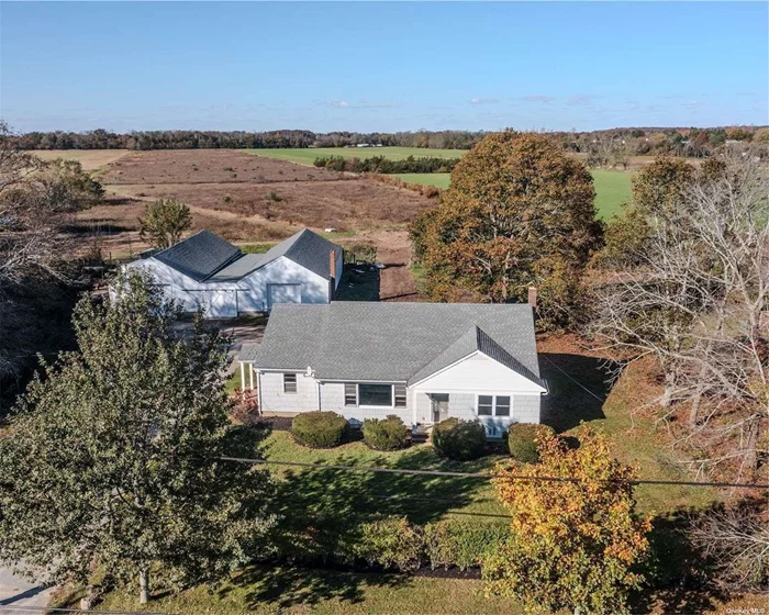 Rare Opportunity Awaits In The Heart Of Mattituck! 20 Acres of Scenic Farmland With A Charming Farmhouse and 4096 Sq Ft Magnificent Barn. 18 Acres Of Breathtaking Vista Will Be Forever Preserved As Agricultural Farmland. Truly Defines The Character Of The North Fork. Bring Your Own Vision And Make This Your Dream!