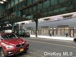 Brand new commercial retail store. **1 min ** to 7 train. shop use area: 750Sf + 1300 Sf basement, 14 feet high Ceiling, large glass Storefront, two bathrooms, near the subway, various of the types commercial business.