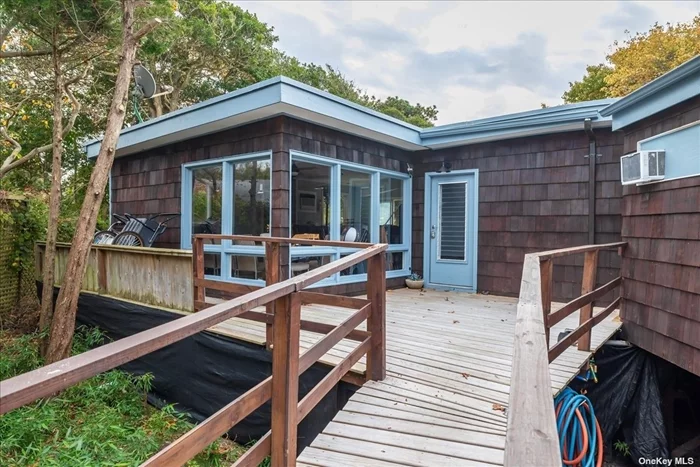 This property is located on Fire Island Pines. A popular destination known for it&rsquo;s beautiful beaches and vacation homes. The main house has a full kitchen, Living Room/Bedroom with sliders, Full Bath and a Dining Area surrounded with windows. Sliders off kitchen lead to new deck with large heated pool. Cottage separate from the main house has 2 rooms, each have 1 Bedroom and full Bath.Updated throughtout with 200amps and plumbing redone. All Updated to making a comfortable and enjoyable place to stay on FireIsland with heated pool and new deck! It&rsquo;s a perfect spot for relaxation and recreation. The presence of a cottage with 2 additional rooms provide extra space for family or guests. Fire Island is a beautiful destination for those looking for a Beach Front getaway!