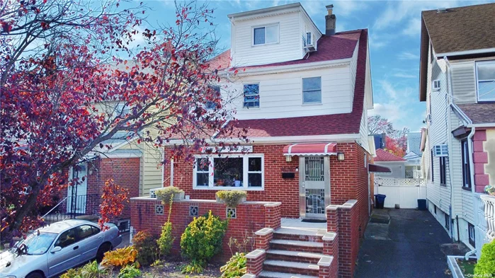 Rare Find 5 Bedrooms 3 Full Bath Colonial in SD #26 Bayside. Driveway & Detached Garage / Outside Entrance to Basement/ Front Garden + Porch / Rear Patio + Large Deck / 1St Floor measures 20ft X41ft: Sunny Living Room, formal Dining room, Large kitchen, Full bath/ 2nd Floor: 3Bedrooms Full bath/ 3rd floor 2 bedrooms./Laundry, full bath, and 3 storage rooms in fully finished basement. Renovated in 2017 and Very Well Maintained. The dishwasher is not represented. All Information Is Deemed Reliable But Is Not Guaranteed.