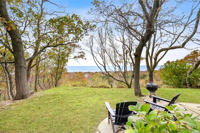 Enjoy stunning water views and all-season access to the Sound from this charming 3-bedroom, 1-bathroom waterfront home. This cozy home channels happy, mid-century vibes. Large living room with fireplace, dining nook, and sunroom, all with breathtaking views of the water. The patio with BBQ is the perfect spot to relax and enjoy the outdoors, and the path to the Sound makes it easy to access the water for swimming and fishing! Ren Permit # 0880