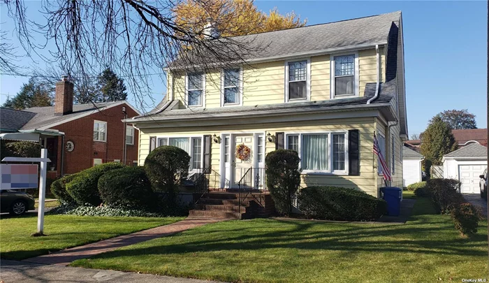 Prime Area Of North Flushing, Large Beautiful Colonial with 60x100, 1 Bed Room and Full Bath, Fire Place, Huge Enclosed Porch on the 1st Fl, And 4 Bedrooms on the 2nd Fl, Full Basement, Detached 2 Car Garage with long Driveway, Walk To Lirr Station, Shops, Park, Bus to Subway