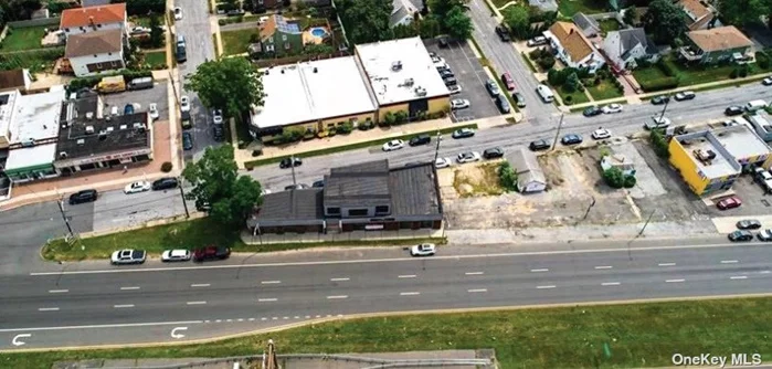 Commercial Building for Lease. Triangle Corner Property. Extremely Visible Corner Property with 400 Ft frontage on busy Sunrise Highway. Seven Curb cuts, and nine overhead doors & transit more than 65, 000 vehicles per day. -Lot Size 33, 593 SQFT -Building Size2, 074 SF-5, 340 SF. -Frontage feet 400 ON SUNRISE HIGHWAY. -ZONING BUSINESS DISTRICT X. Commercial Lease/Rentals.