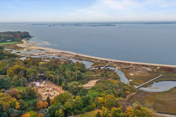The property is a private estate located at the end of a cul-de-sac. One of the only waterfront properties of substantial acreage on the North Shore of Nassau County, this parcel is located in Sands Point directly on the shore of Long Island Sound overlooking New York City. This unrivaled 4-acre expanse of land provides a rare opportunity to have up to a 9, 000 square foot residence with a 112 foot private beachfront on Half Moon Beach and a creek on the Property. This is a rare opportunity to create an estate compound of exceptional privacy and tranquility while being in close proximity to the following: -Downtown Port Washington with Long Island Railroad transportation (35 minutes to Manhattan), restaurants, banks and shopping. -Sands Point Golf Club -Harbor Links Golf Course -Guggenheim Preserve -St. Francis Hospital