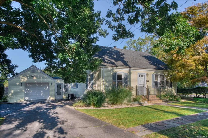 Charming Vintage 1940&rsquo;s Cape with accessory apartment on a quiet corner in Greenport Village. Ample room for everyone in this 4 bedroom, 2 bath home which includes a first floor attached studio apartment with light-filled sunroom. Outside, the large backyard is perfect for hosting guests and enjoying the outdoors. The attached garage provides plenty of room for your car and extra storage space A perfect place to call home in Greenport Village.