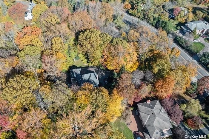 Stately 10-room Tudor with Breathtaking Panoramic Water Views. Sitting on 1.7 acres of Partially Wooded Land in the Desirable Village of Kings Point overlooking Manhasset Bay, Buyer has the Option to Work with the Present Owners to Complete Property Renovation to their Preference. See Aerial Tour or Copy and Paste into Browser: https://tour.vht.com/434356251/375-e-shore-rd-great-neck-ny-11023/aerialvideo/idx