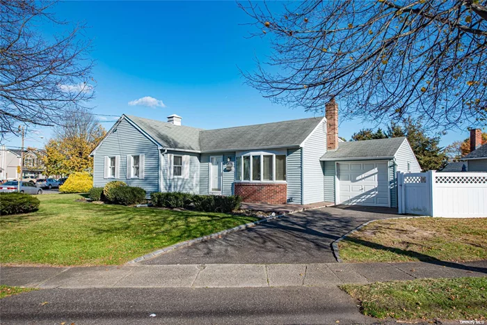 Expanded Twin Oaks ranch in Babylon Village served by the West Babylon school district. TWO bathrooms, FULL basement, hardwood floors, and L-O-W  L-O-W taxes too !