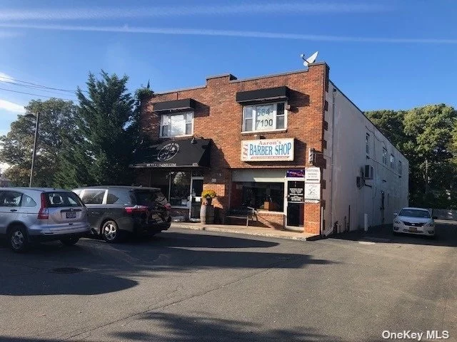 Two story retail building with 30 car parking. 3 tenants ( 2 have short leases ) and all want to renew or stay. Current NOI is $60, 852. Each floor is 2, 934sf. RE Taxes are approximately $25, 000. . Do not disturb the tenants. Next to Dunkin Donuts