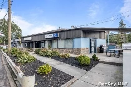 Newly renovated property. 7 unit office building, . Perfect for any owner user. Possibly conversion to residential units. Under 1 mile from the North Port Train station. 15 Parking spaces . OWNER FINANCING AVAILABLE AT 8 % !