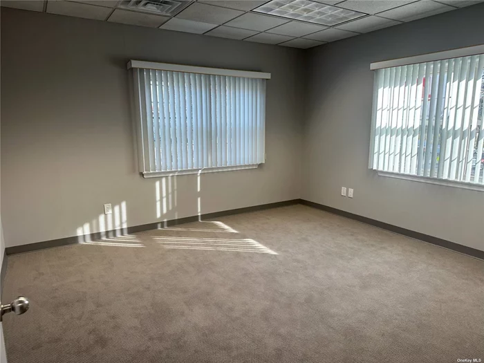 One of three offices that may be rented individually or combined in a professional building. 10x13 ($800/mo), 10x13 ($800/mo), 14x14 ($1000/mo), with access to conference room on lower level and two bathrooms.