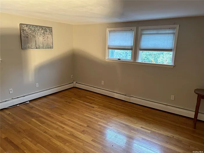 Beautiful clean and newly painted. All Large Rooms, Plenty Of Closets, Gorgeous Wood Floors. Tenant pays electric and cable. Parking on street