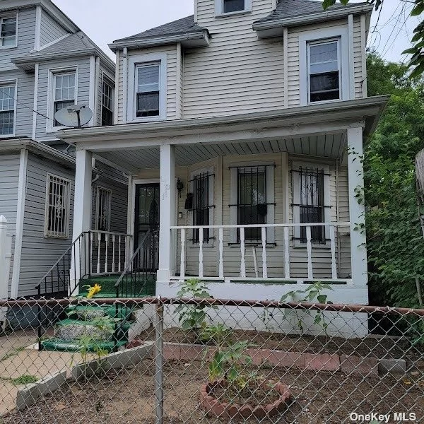 Detached Colonial. 3 Bedrooms upstairs with full bath, Livingroom, Formal dining room currently used as 4th bedroom.. Eat in kitchen. Private fenced yard, full basement. New Roof with Solar Panels. Near public transportation, shopping, houses of worship, highways.
