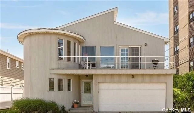 This contemporary home is located just seconds away from the beach, offering a beachside living experience. This single family property consists of two living areas, each with its own unique features. The upper area comprises three bedrooms and 1.5 bathrooms. It boasts a beautiful open floor plan with a bright and airy atmosphere. The kitchen in the upper area is equipped with stainless steel appliances and granite countertops, creating a modern and elegant space. The kitchen seamlessly connects to the spacious living and dining room area, promoting an open concept design. Additionally, the upper area features a front deck with ocean views, providing a perfect spot to relax and enjoy the scenery. There is also a spacious backyard, offering more outdoor space. The lower area of the home includes two bedrooms and one bathroom. The lower area also includes its own washer and dryer for convenience. Overall, this contemporary single family home provides a comfortable and stylish living environment with its open floor plans, spacious layout with ample bedrooms, and beautiful outdoor areas. Its close proximity to the Atlantic Ocean makes it an excellent choice for those seeking a beachside lifestyle.