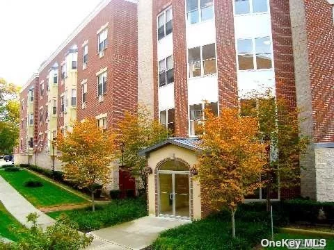 Rare 3 bedroom rental apartment with 2 full baths, in updated elevator building. Ideally located near town/LIRR/MTA bus. P/T Doorman. Modern kitchen with fully ventilated gas stove, stainless steel appliances and lots of counter space. King size primary bedroom with en-suite full bathroom with stall shower. In-unit combo Washer/Dryer. Polished hardwood flooring throughout. Heat and water included in rent. One Dedicated parking spot in building garage included in rent. No board approval! Scenic and quiet rear-facing end unit looks out onto lush trees and creek. Won&rsquo;t last!