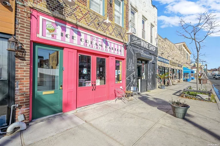 Nestled in the heart of the vibrant Rockaway Beach community, this mixed-use property provides a unique and lucrative investment opportunity that combines a beloved ice cream parlor on the ground floor with an impeccably designed 1-bedroom apartment on the second floor. Step into the ground floor and be enchanted by the delightful atmosphere of a well-established and beloved Mara&rsquo;s ice cream parlor. The space is not just a business; it&rsquo;s an experience. Patrons can savor their sweet treats in a cozy and inviting setting, or take advantage of the sandy, beach-like backyard-an oasis that adds a touch of seaside charm to the entire property. Ascend to the second floor, where luxury living meets beachside convenience. This floor boasts a meticulously designed 1-bedroom apartment featuring a walk-in closet, in-unit washer/dryer, and a designated office space. Every detail has been carefully curated to create a living space that blends comfort with style, offering a retreat from the lively atmosphere below. The ice cream parlor, a local favorite, has three years remaining on its lease with the added benefit of an option to renew for an additional five years. This provides stability and a guaranteed income stream for the savvy investor, making this property an enticing prospect for those looking to capitalize on a flourishing business with a solid foundation. Situated in the heart of Rockaway Beach, Queens, this property enjoys proximity to the sandy shores and the vibrant energy of the community. Residents and visitors alike are drawn to the area for its laid-back beach lifestyle, eclectic shops, and a burgeoning culinary scene. Whether you&rsquo;re an investor seeking a reliable income stream or a homeowner looking for a unique residence with added income potential, this mixed-use gem in Rockaway Beach presents a rare opportunity. Seize the chance to own a slice of coastal paradise with a thriving business and designer living space.