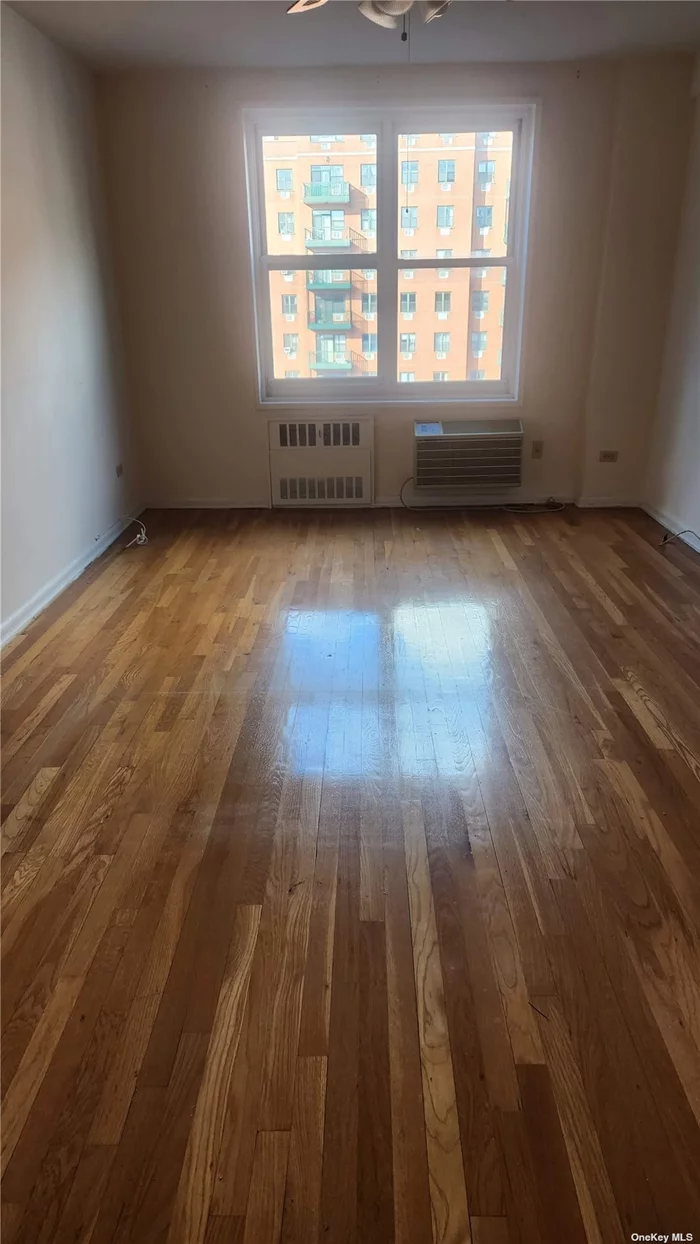 You have to come and see this spacious 1-bedroom CO-OP in the heart of the vibrant Flushing neighborhood offering a comfortable living space for individuals or couples. Access to building amenities such as parking and laundry room