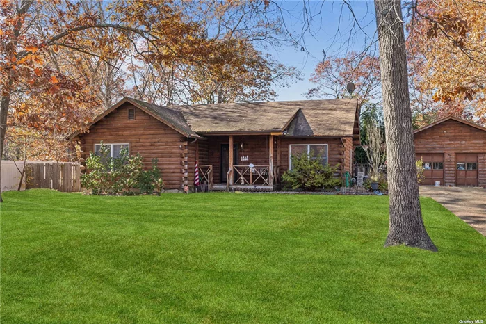 Cute and Quaint 2BR, 1bth Log Cabin Home set on a beautiful 1/2 acre property with patio and a great 2 car detached garage. Large Eat in Kitchen and cozy living room. Endless possibilities to make this unique home your own!