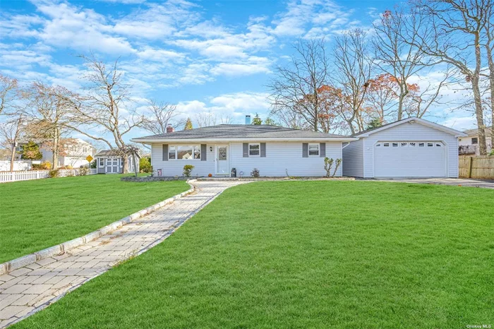 The charming ranch, complete with a white picket fence, is sure to capture your heart. As you stroll through the yard, envisioning the possibility of beautiful landscaping, you&rsquo;ll notice the generous two-car garage with a trailer hookup, a bonus room, and a shed, providing ample space for all your storage needs. Upon entering, cozy up next to the wood-burning stove in the living room, complete with lovely vinyl wood plank flooring that adds to the home&rsquo;s charm. The spacious kitchen offers slow-close cabinets, a lazy susan, and a propane stove, making it an ideal place to prepare delicious meals. This delightful home features a large primary bedroom and two additional rooms perfect for guests or hobbies. You&rsquo;ll feel secure with the sprinkler and alarm systems. Additionally, the new washer and dryer, CAC condenser unit (installed August 2023), and new roof (installed in 2021) ensure peace of mind. This home is truly a gem, waiting for you to make it your own. Don&rsquo;t miss this chance to live out your happily ever after in this beautiful home.