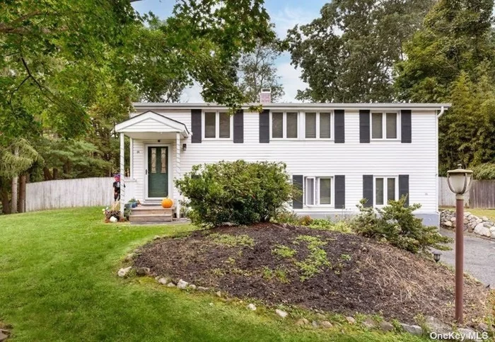 Beautifully Renovated 4 bedroom Colonial in Three Village SD, Bright & Spacious Living Areas, Sparkling Quartz Countertops & White Cabinets in Eat in Kitchen, Skylight in Family Rm, Central Air Conditioning, Fireplace in Liv Rm, 2 Full Baths, Slider to deck in Family Room & Primary Bedroom, Fenced Yard