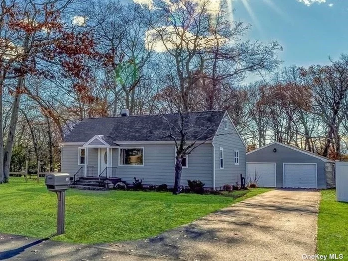 This Stunning Renovated 3 bedroom 1 bath ranch on a shy acre in Center Moriches truly has it all. Features include: New eat in kitchen with custom cabinetry, quartz countertops and backsplash, stainless steel appliances, and large pantry. All new flooring throughout. Updated bathroom, molding, paint, heating system, roof, siding, oil tank and windows, New washer & dryer. New Central Air Conditioning, full Basement and oversized multi-car garage. Low taxes. Situated on a large park like property on a quiet dead end street. Close to the Hamptons, shopping, restaurants and beaches.