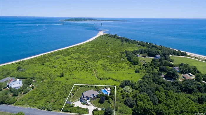 Experience breathtaking views of Long Island Sound and Orient Point County Park from this spacious open-concept home. This beautifully updated 4-bedroom, 4-bathroom residence offers a private 20x40 heated saltwater in-ground pool and serene backyard. Host memorable gatherings in the spacious kitchen, perfect for indoor and outdoor dining. The expansive master suite boasts breathtaking views, a king-size bed, an office nook, dressing area, a full bathroom, and a private balcony. The lower level features a cozy sitting and entertainment room, an exercise room, a full bathroom, laundry facilities, a 2-car garage, and direct access to the pool and backyard. Enjoy easy access to the pristine sound beach, hiking trails, Orient State Park, and Duryeas restaurant. Located at the tip of Long Island, this exceptional home is perfect for anyone seeking coastal living with ample entertainment and relaxation space. Permit# 0234. Offered Apr $11, 000; May $20, 000; June $25, 000; Sept 5-30 $25, 000; Oct $20, 000; Nov $15, 000.