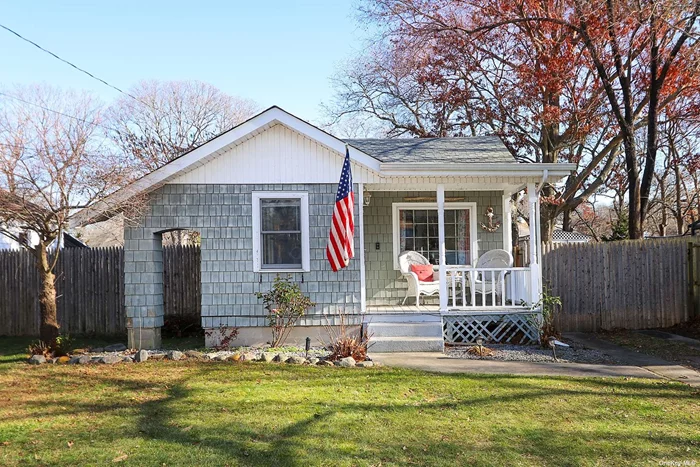 Welcome home to this well maintained, charming ranch home situated on a 0.23 acre lot. This home features a welcoming front porch, living room, 2 bedrooms, full bath, and eat-in kitchen with electric cooking and easy access to the yard. New flooring installed within the last 4 years. Hardwood floors under the front rooms of the home. Massive 2-car detached garage with full second story offers endless possibilities, including mother/daughter with proper permits. Ample driveway and street parking. Large backyard with tiki bar is the perfect place for relaxing or hosting backyard BBQs! Boiler replaced and roof completely redone just 3 years ago. Middle Country School District (New Lane Memorial Elementary School, Selden Middle School and Newfield High School). Why rent when you can own?? Don&rsquo;t Miss The Opportunity To Make This House Your New Home!