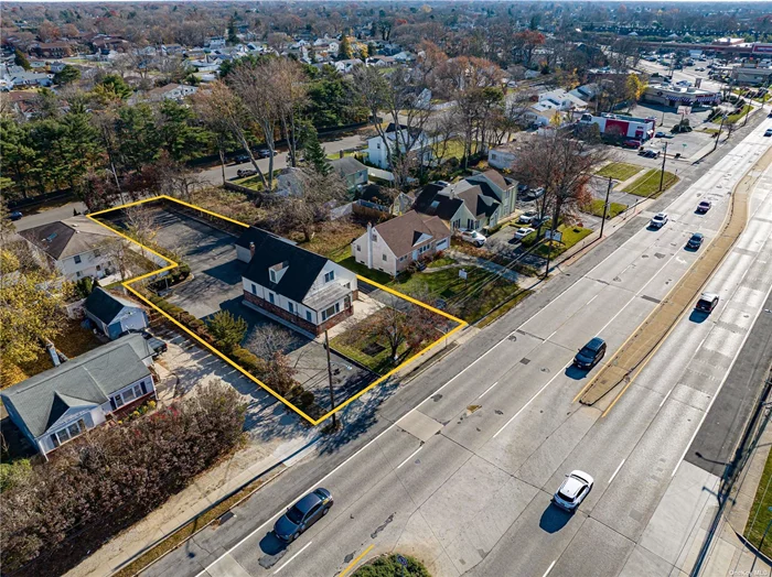 This UNIQUE property extends street to street, fronting Deer Park Avenue and backing at 252 East 1st Street. Zoned Bus E this location has served as a medical office for 65+ years. This 2 story building features a full basement with outside entrance, a second story with a bath and outside entrance, and a detached 20x22 garage. Dual North & South Driveways. Ample parking in the rear of the building (252 East 1st Street)