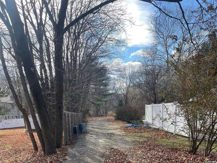 Great .787 Acre Building Lot Behind # 826 Canal Road , Gravel Driveway to this Flag Lot is on the Left Side The Lot is level and abuts the Town of Brookhaven property on the left side,  Close To major Highways , Brookhaven National Lab, Long Island North Fork Wineries.... Come Build Your Dream Home ...