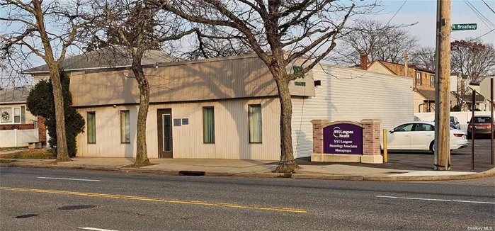 Free Standing building on busy road currently being used as a medical office. Can also be for other professional office types. Reception area, waiting room, 9 rooms (offices and exam rooms), 2 bathrooms, front entrance and rear door. Private Newly Redone parking lot with Approx 11 spaces. HVAC. 1.5 miles from LIRR.