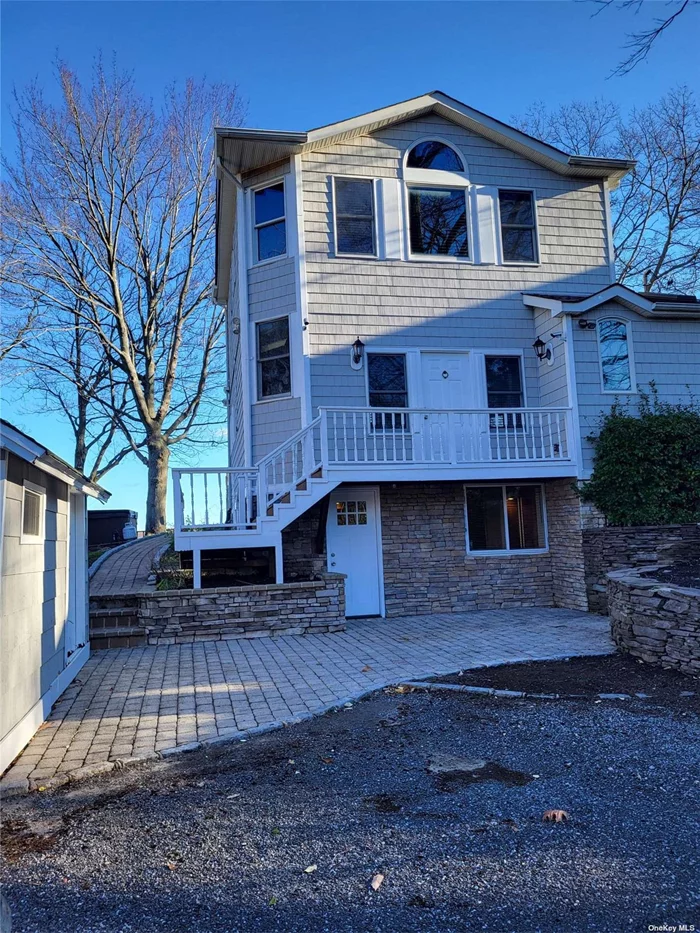 Absolutely stunning waterfront location. Gorgeous views of Port Jefferson Harbor. Enjoy sunrise and sunsets from all levelsof this spectacular home! Live like you are on vacation! Mooring ad beach rights! Stairs to your private beach with boat house. Bright and airy! A dream come true!