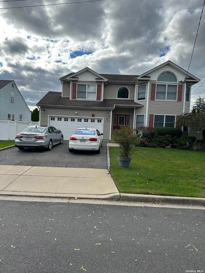 Property move in ready. huge 4 bedrooms, 2.5 bathrooms. Master suite has 2 walk in closets, master bathroom with Jacuzzi tub and stand up shower. Huge finished basement. 1st floor boasts living room, separate dining room , eat in kitchen, huge family room/den and a half bathroom.