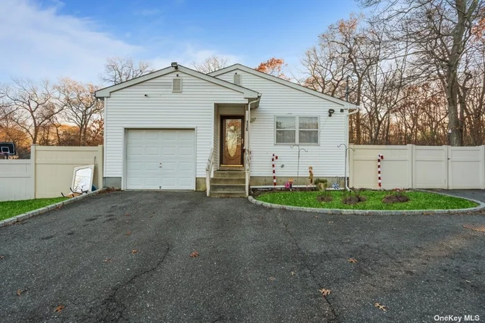 well-maintained 3 bedroom ranch home, Primary bedroom with a half bath, 2 bedrooms, full Finished with its own entrance, Split A/C system Hardwood Wood floors throughout the main level. attached one car garage with storage.fully fenced property. Circular blacktop driveway, Must see