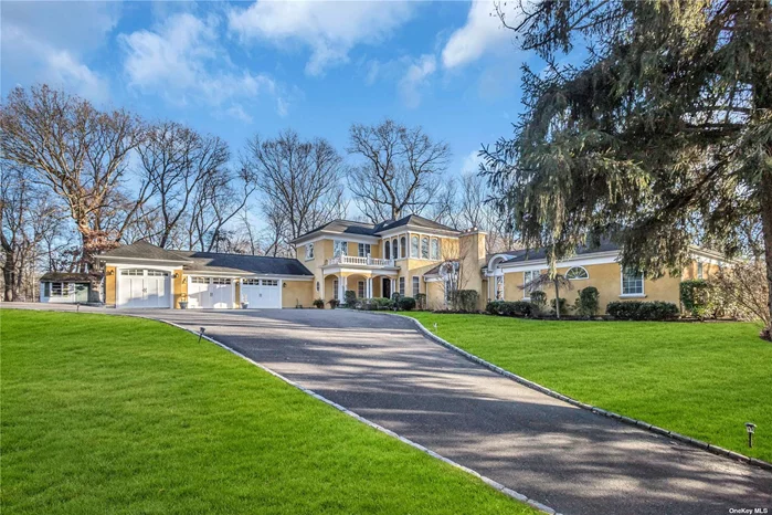 NESTLED ON 2.34 ACRES IN THE VILLAGE OF MUTTONTOWN&rsquo;S PRIVATE ENCLAVE WITH SYOSSET SCHOOLS, THIS MAJESTIC EUROPEAN-INSPIRED HOME EXUDES LUXURY. THE GRAND ENTRANCE BECKONS WITH A CUSTOM ROUNDED STAIRCASE AND OAK BANISTER. THE ENTIRE SECOND-FLOOR CONSISTS OF A PRIMARY SUITE THAT BOASTS A TRAY CEILING, EXPANSIVE WALK-IN CLOSET, AND A MODERNIZED BATHROOM WITH JERUSALEM TILE, DOUBLE SINK VANITY, JACUZZI TUB, AND FRAMELESS GLASS SHOWER. THE OPEN FIRST FLOOR PLAN DAZZLES WITH A CHEF&rsquo;S KITCHEN, EXCESSIVE CUSTOM CABINETRY, GRANITE COUNTERS, OVERSIZED ISLAND, VIKING DOUBLE OVEN WITH A 8 BUNER STOVE & WARMER, A PORCELONOSA CUSTOM VENT HOOD AND A DOUBLE SUBZERO FRIDGE/FREEZER. A FORMAL DINING ROOM WITH WOOD BASE MOLDING AND VAULTED CEILING WITH SKY-LIGHTS LEADS TO A TWO TIER GREAT ROOM WITH VAULTED CEILINGS AND EXPOSED BEAMS, WET BAR, AND FRENCH DOORS OPENING TO A LARGE NICOLOC PAVER PATIO WITH BLUE STONE. A WOOD-BURNING FIREPLACE ADDS WARMTH ON THE UPPER LEVEL OF THE GREAT ROOM. THE FIRST FLOOR ALSO FEATURES 4 BEDROOMS WITH AN EN-SUITE WITH A PORCELAIN TILED FULL BATHROOM, A JUNIOR SUITE WITH UPDATED TILED BATHROOM, AND TWO ADDITIONAL BEDROOMS WITH A JACK AND JILL BATHROOM. A THREE-CAR GARAGE INCLUDES A TESLA FAST CHARGING STATION, AND A BRAND NEW KOHLER FULL HOME GENERATOR THAT SITS OUT-SIDE.  THIS RESIDENCE HARMONIOUSLY BLENDS EUROPEAN ELEGANCE, MODERN AMENITIES, AND SPACIOUS DESIGN FOR A TRULY LUXURIOUS LIVING EXPERIENCE.