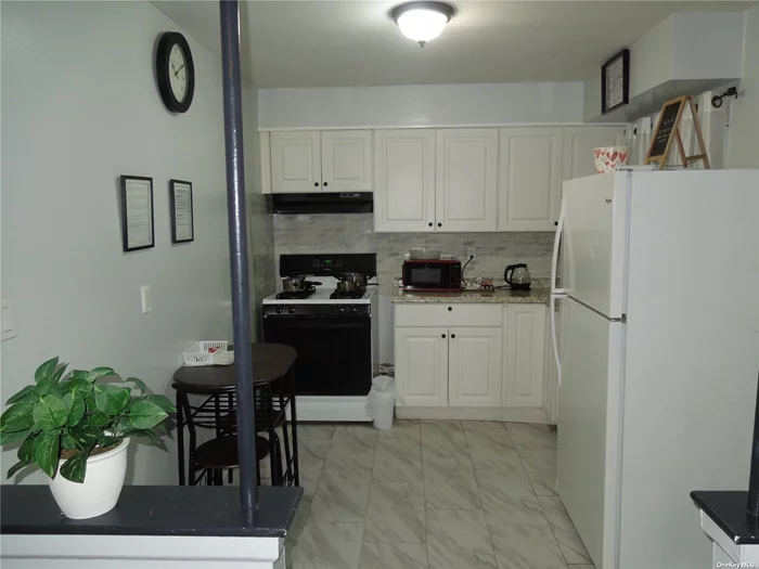 This is an exquisite updated 1 bedroom apartment, with central air and keyless entry. Nested in a cozy tree lined Rosedale neighborhood. Separate side entrance on 1st floor. Large living room, 1 bedroom, eat-in-kitchen, bathroom, tiled and wooden floors. This is a must see, you will love the decor. Landlord requires a credit report, personal references, proof of income and W2 info. Close to public transportation, schools, Church of Worship, Brookville Park, Green Acres Mall, JFK and the Belt Parkway. ** CAN BE RENTED NON-FURNISHED AT $2, 000.00 OR FULLY FURNISHED AT $2, 200.00. ** Tenant pays for heat, gas and electric. Wired for Cable and Wi-Fi.