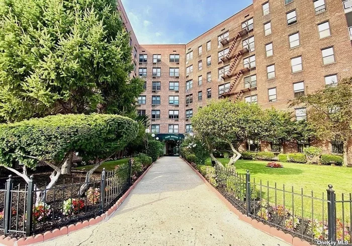 THE PARK MANOR CONDOMINIUM - This is a unique opportunity, and rarely available, to own a 3-bedroom CONDO with a Terrace in the heart of Forest Hills! A very spacious and sunny, corner apartment with southern exposure, offers an entry foyer with 2 large closets, large living room and separate dining area - perfect for entertaining! A Large terrace with Southwestern views, and plenty of natural light in every room. Wood floors throughout the entire apartment, updated windowed kitchen with granite countertops and modern cabinets. The primary bedroom can fit a king-size bed, has its own custom walk-in closet and a fully renovated bathroom with frameless glass doors. The second bedroom is very large and can fit a king-size bed or 2 twin beds, with a large double closet. One additional renovated bathroom with a tub. The third bedroom is sizable and can fit a Queen bed. The Park Manor Condominium is a well maintained and financially sound Condo, it features an elegant lobby, new elevators, beautifully maintained grounds. Additional amenities include doorman service, live-in super, 2 laundry rooms, Pet Friendly building, and indoor parking. Centrally and conveniently located, near M & R trains, Buses, shops, restaurants, NY Sports Club. Short walking distance to Austin Street&rsquo;s trendy shops and restaurants, movie theatres, Sunday&rsquo;s Farmers Market Trader Joes, Forest Hills Stadium, the West Side Tennis Club, and LIRR. Low HOA fee of $857.00 which includes heat, hot water, and cooking gas.