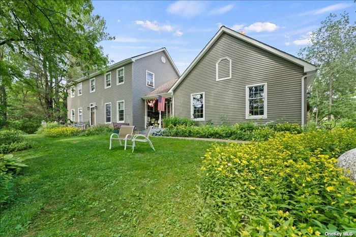 Welcome to your peaceful country retreat in Easton, nestled on 10 acres with breathtaking views. This charming home offers 3 spacious bedrooms, 2.5 bathrooms, wide pine floors, custom cabinetry, an open floor plan, and a cozy four-season porch. Outdoors, enjoy a 16x32 in-ground pool, perfect for summer relaxation. The lower level features 8-foot ceilings and a partially finished basement, great for extra living space or storage. Beautiful flower gardens and landscaped grounds add to the charm. Recent updates include a new roof, slate walkways, a Generac system, and a gravel driveway. A 32x40 post-and-beam barn provides space for a workshop, studio, or RV storage.