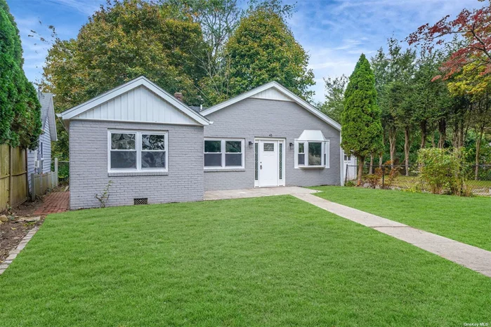 Fully Renovated Ranch . Three Bedrooms , Two Full Baths. Open Concept Livingroom, Dining Room , Kitchen. Hardwood Floors Throughout. Quartz countertops, Stainless Steel appliances. New Vinyl Siding, New Roof, New Plumbing. CAC . Location, Location, Location.
