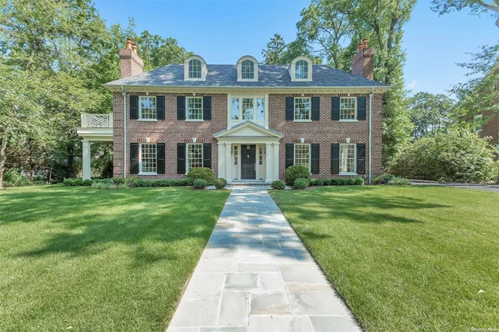 Step Into This Grand & Stately 6 Bedroom, Brick Center Hall Colonial Which Offers The Finest In Bespoke Finishes Throughout. Located On A Sought After, Tree-Line Street In The Heart Of Manhasset, This Designer Showplace Boasts Three Floors Of The Ultimate In Luxurious Living. Step Into The Grand Double-Height Entry With Beautiful Architectural Features & Gorgeous White Oak Wood Flooring. An Elegant Formal Dining Room With Adjoining Chic Butler&rsquo;s Pantry Provides Ease & Elegance For Entertaining. A Stunning, Sun-Drenched Formal Living Room Will Delight As Will The Gourmet Eat-In Kitchen With Island. The Stylish Family Room With Gas Fireplace & French Doors Leading Out To The Bluestone Patio, Will Be The Perfect Place To Entertain Or Relax With Family & Friends.  The Second Floor Offers A Serene Primary Suite With A Spa-Like Marble Primary Bath With Radiant Heated Floors, An Oversized Walk-In Closet & French Doors Leading To A Private Oversized Deck Overlooking The Lush Property. Three Additional Family Ensuite Bedrooms, Beautifully Designed With Custom Marble Bathrooms & Laundry Room Complete The Second Floor. A Spacious Walk-Out Lower Level With Gym, Suite, Full Bath & Plenty Of Recreational Space Is An Added Bonus. This Beautifully Staged Property Offers The Potential Of A True Turnkey Opportunity. Close To Shopping, Restaurants & The Convenience Of The Long Island Rail Road For An Easy Commute To New York City .