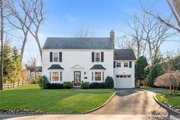 Discover the epitome of Center Hall Colonial elegance in this meticulously maintained home in sought-after Flower Hill in Roslyn. Boasting 3 bedrooms and 1.5 baths, this residence exudes warmth and character. Step into the formal living room featuring a cozy fireplace, eat-in kitchen, adorned with high-end appliances, is a chef&rsquo;s delight. A delightful four-season room bathes the home in natural light, offering a versatile space for various activities. The finished lower level provides additional living space, ideal for entertainment or a home office Outside, an expansive and breathtaking property awaits, offering a serene escape with its lush landscaping. Notable features include a slate room, adding to the home&rsquo;s timeless appeal. This colonial gem promises a harmonious blend of classic charm and modern comfort. Port Washington parking permit.