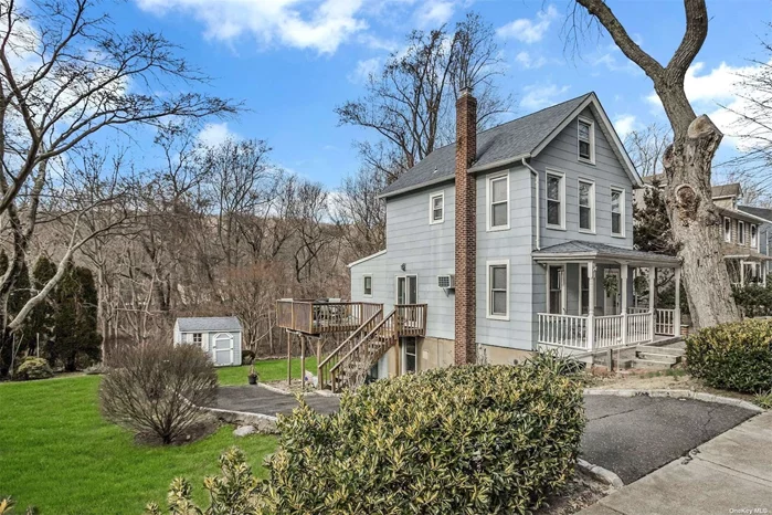 This charming country colonial home is located in the historical hamlet of Oyster Bay, and this oversized property has 2 private driveways and a spacious yard. This well kept home has been well maintained over the years. The original home was expanded to add a second kitchen on the main level, with the original kitchen remaining in the lower level. The lower lever/basement is ground level at the back of the house and has an outside access. Located close to the town with lots of restaurants, shops and minutes to Oyster Bay&rsquo;s beautiful beach, the Theodore Roosevelt Memorial Park, the Waterfront Center, a Marina and the LIRR Oyster Bay station.