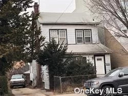 This Is A 38X100 Lot ...2 Family House With A R5B +C2-2 Zoning (potential to build 10, 000+ sq ft, mixed used with full basement)... Conveniently located 1.5 blocks away from Northern Blvd (stores, buses, restaurants) and L.I.R.R..