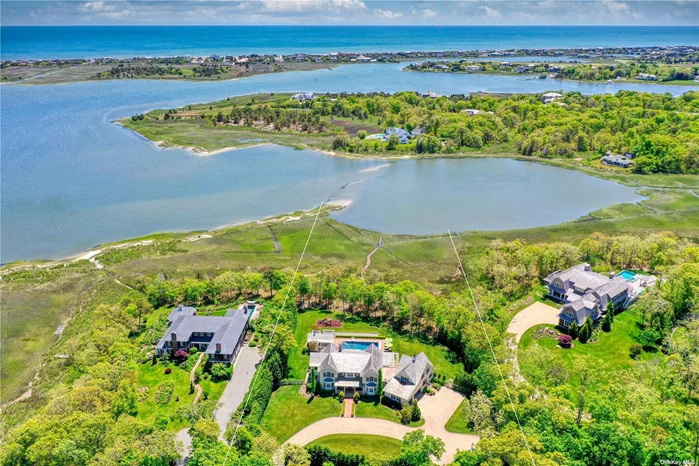 Now Offered this exquisite turn-key traditional home nestled on a generous 2.29-acre lot in the idyllic village of Quogue South. Built in 2016, this stunning 6, 400 square-foot residence boasts five spacious bedrooms and seven luxurious full bathrooms, offering both comfort and sophistication to those who call it home. Upon entering, be captivated by the expansive waterfront views that provide a breathtaking backdrop to daily living. The gourmet eat-in kitchen features a stunning 51 x 108 Jaide Marble countertop, an elegant crawford ceiling, and a convenient butler&rsquo;s pantry complete with a wine fridge and ample overhead storage. Retreat to the tranquil primary bedroom, which offers a romantic Juliette balcony, dual walk-in closets, and a spa-like en-suite bathroom with a steam shower and stand-alone tub. Enhancing the primary suite is an attached office that opens onto a shared deck, perfect for peaceful moments of solitude or remote work. Experience the joy of both first and second-floor laundry rooms, designed for the ultimate convenience. Additional interior highlights include a 1st floor room perfect for a gym, an en-suite bonus room, and a three-car garage with epoxy floors. Step outside and immerse yourself in the serene atmosphere of the meticulously landscaped grounds. The expansive south-facing screened-in porch, adorned with mahogany decking, provides an inviting space to unwind and entertain. The 20&rsquo; x 40&rsquo; gunite heated pool beckons you to enjoy a refreshing swim, while the 250 square-foot en-suite pool house-complete with a fridge and sink-offers an ideal setting for alfresco dining and relaxation. Don&rsquo;t miss the opportunity to call this extraordinary residence your own. Impeccably designed and flawlessly executed, this home promises a life of luxury, tranquility, and unforgettable memories in the enchanting village of Quogue South.